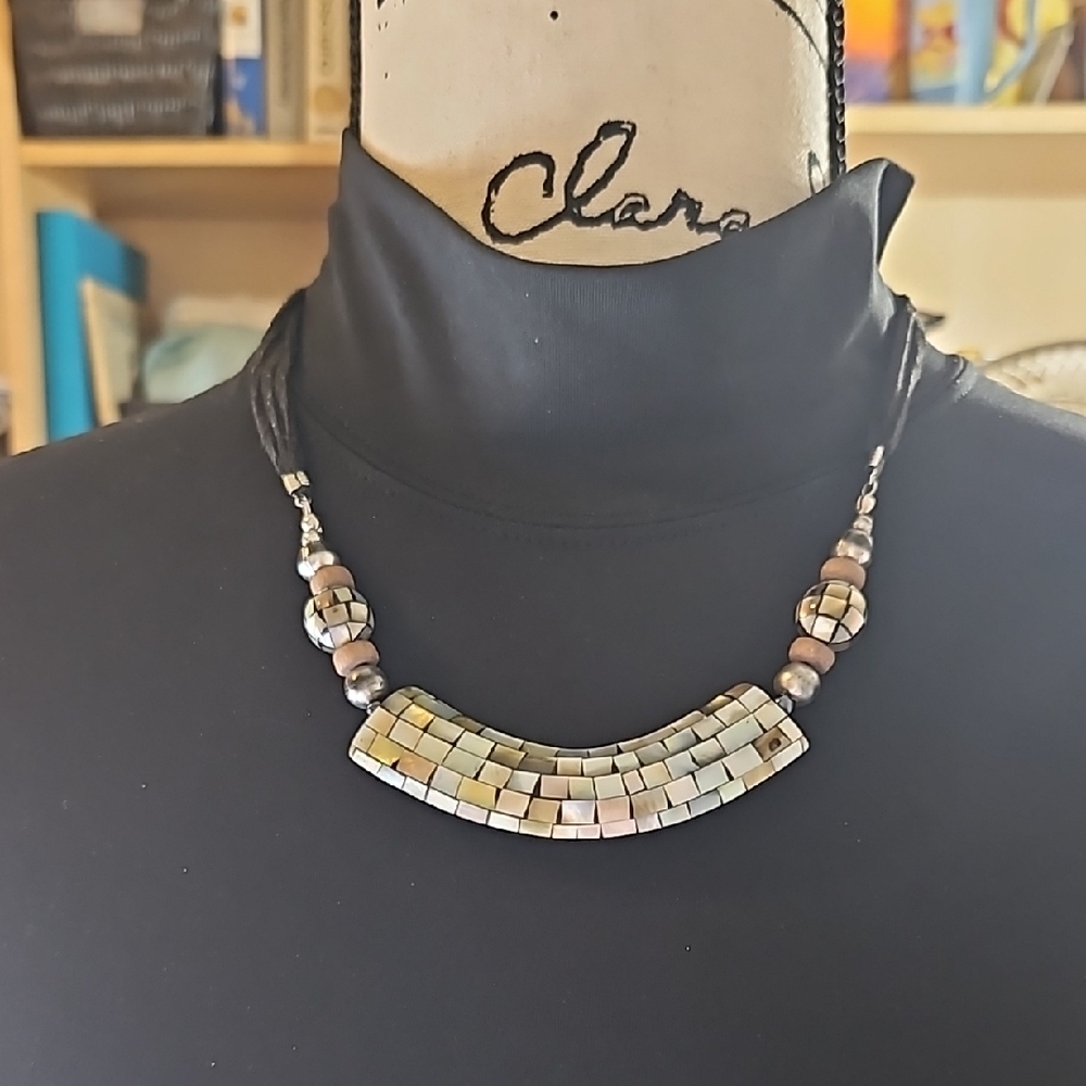 Shell necklace on black cord